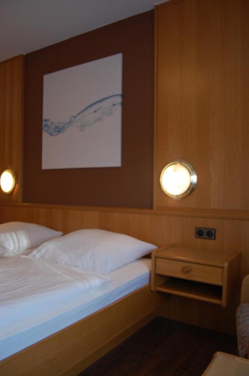 Postel nebo postele na pokoji v ubytování Hotel Hubertushof