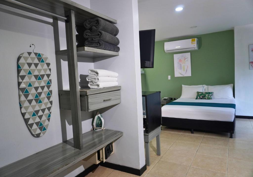 Postel nebo postele na pokoji v ubytování Greenview Medellin By St Hoteles
