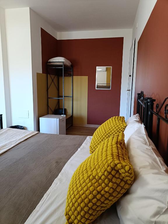Postel nebo postele na pokoji v ubytování B&B Sbarco dei 1000