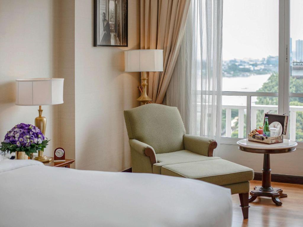 Postel nebo postele na pokoji v ubytování Sofitel Phnom Penh Phokeethra