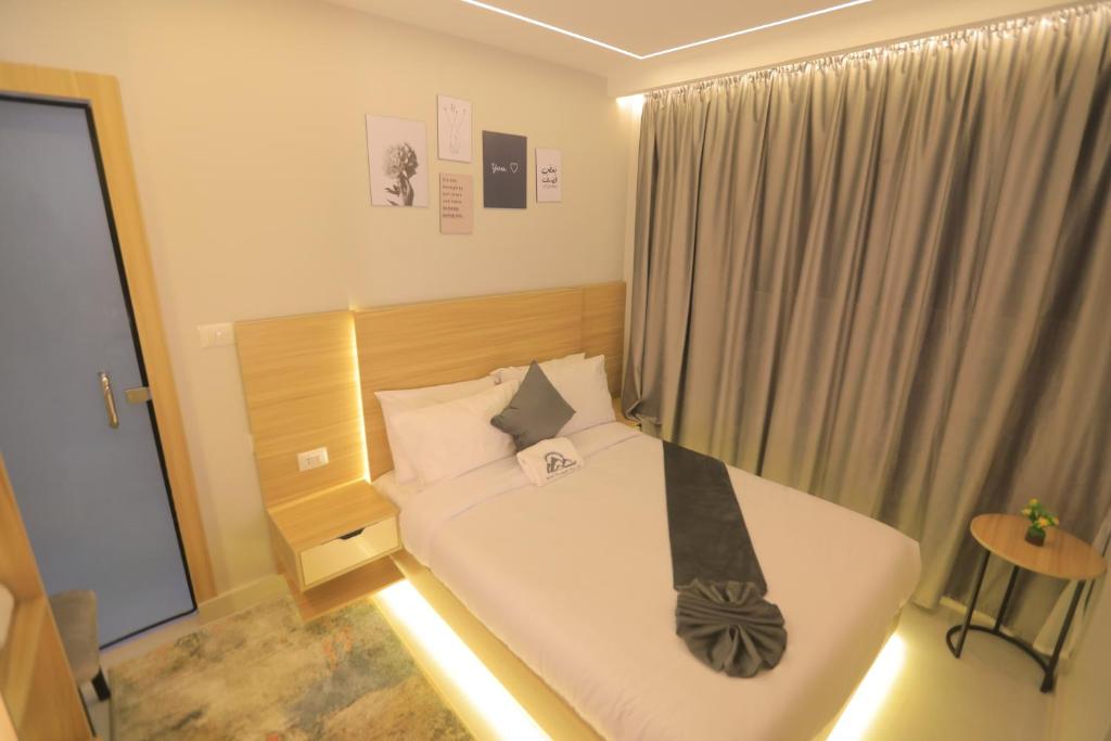 Postel nebo postele na pokoji v ubytování Royal View Pyramids Hotel