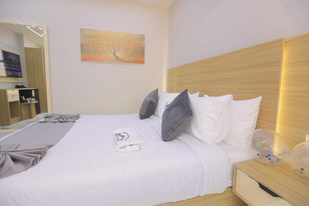 Postel nebo postele na pokoji v ubytování Royal View Pyramids Hotel