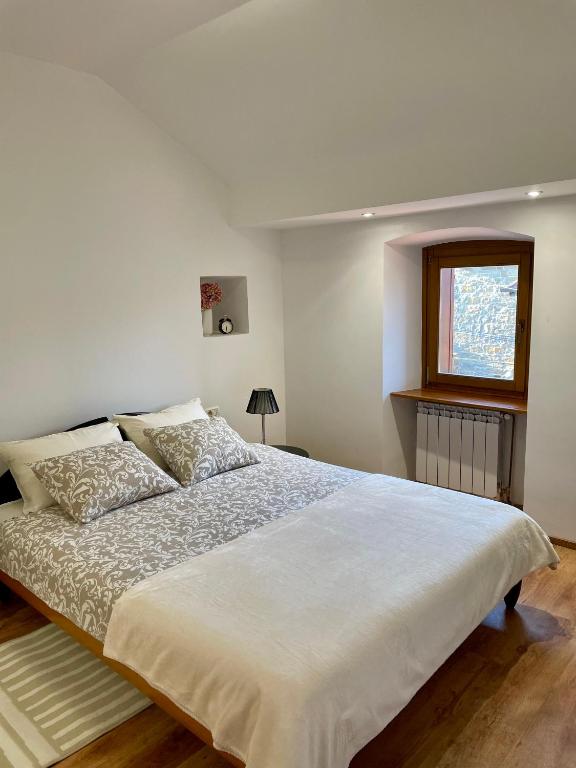 Postel nebo postele na pokoji v ubytování Istrian house Casa del nonno