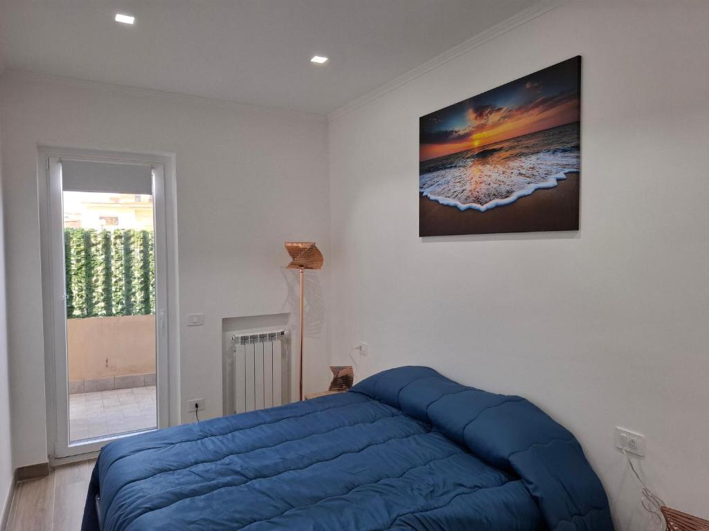 Postel nebo postele na pokoji v ubytování Casa Lizy
