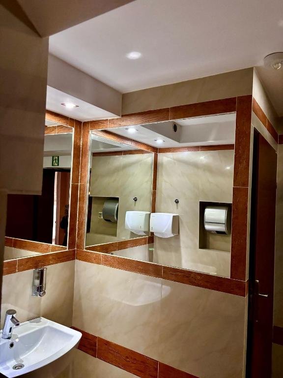 Koupelna v ubytování Hotel Orion