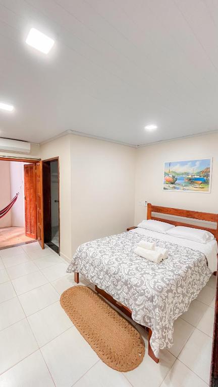 Cama ou camas em um quarto em Yes Hotel Pousada