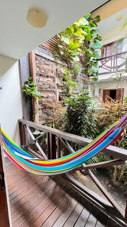 Um jardim em Yes Hotel Pousada
