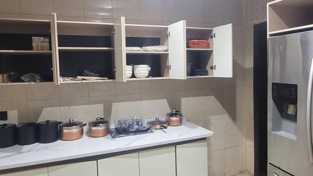 Kuchyň nebo kuchyňský kout v ubytování Bayview Apartment