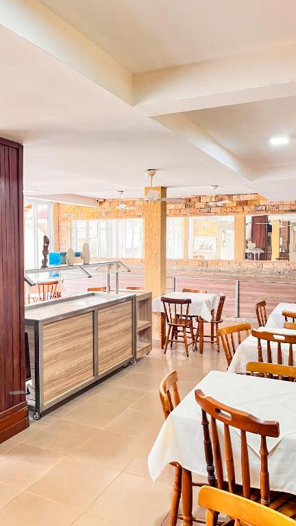 A cozinha ou cozinha compacta de Yes Hotel Pousada
