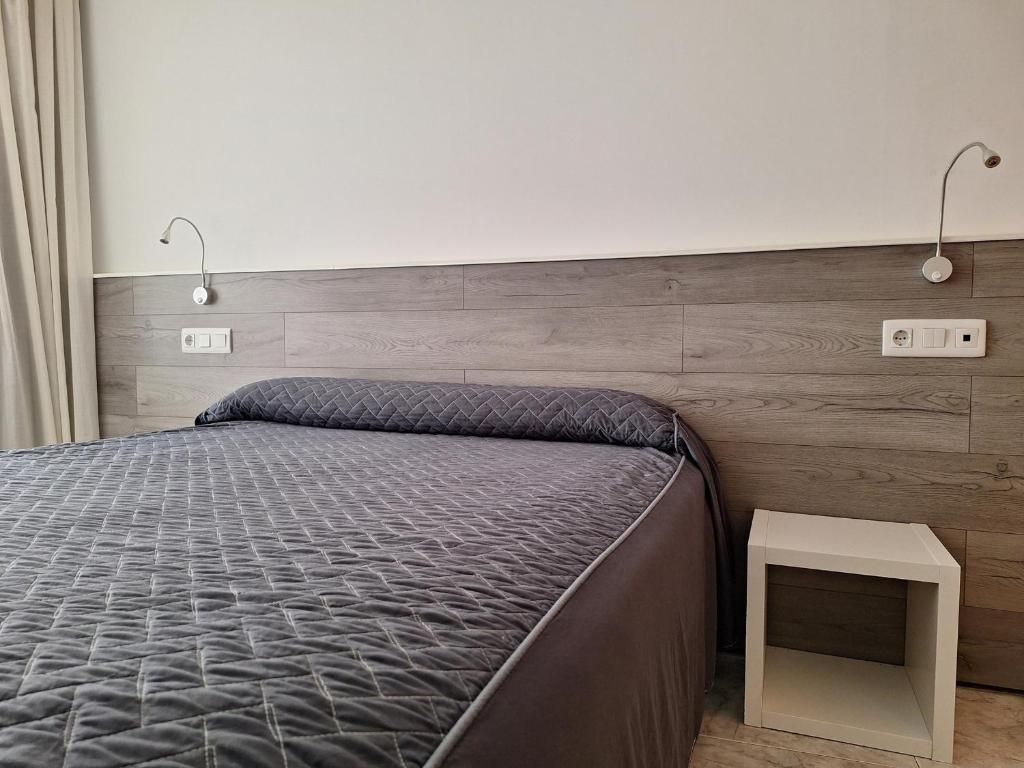 Cama o camas de una habitación en Hotel Xauen