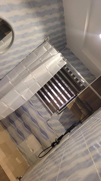 Postel nebo postele na pokoji v ubytování Bayview Apartment