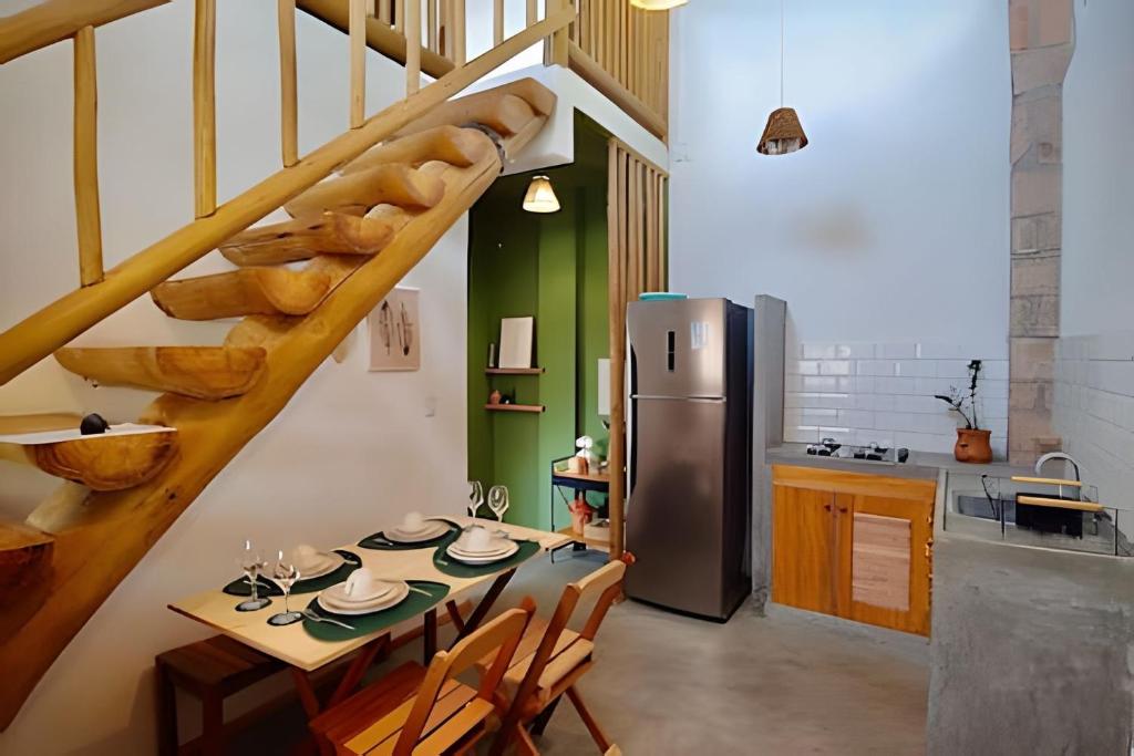 Η κουζίνα ή μικρή κουζίνα στο Casa dos Pássaros - AR Condicionado nos dois quartos