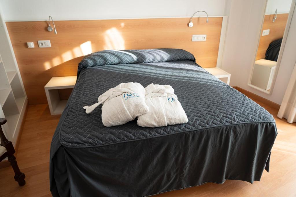 Cama o camas de una habitación en Hotel Xauen