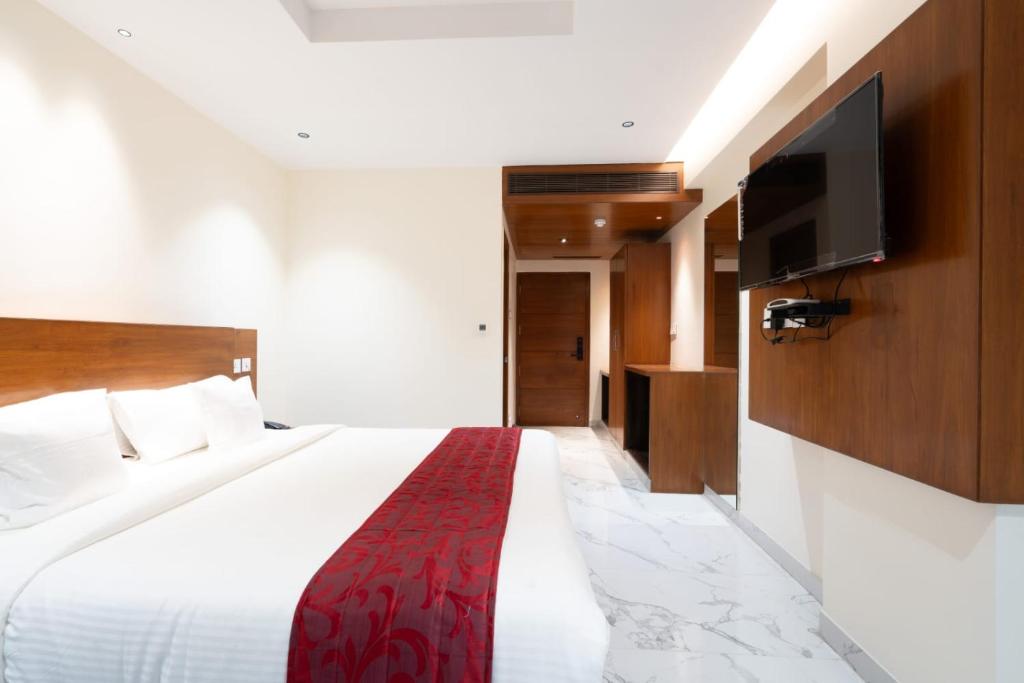 TV a/nebo společenská místnost v ubytování Hotel Vilvah