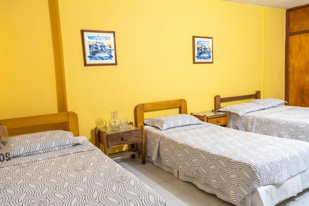 Postel nebo postele na pokoji v ubytování Hotel Veleros Cartagena