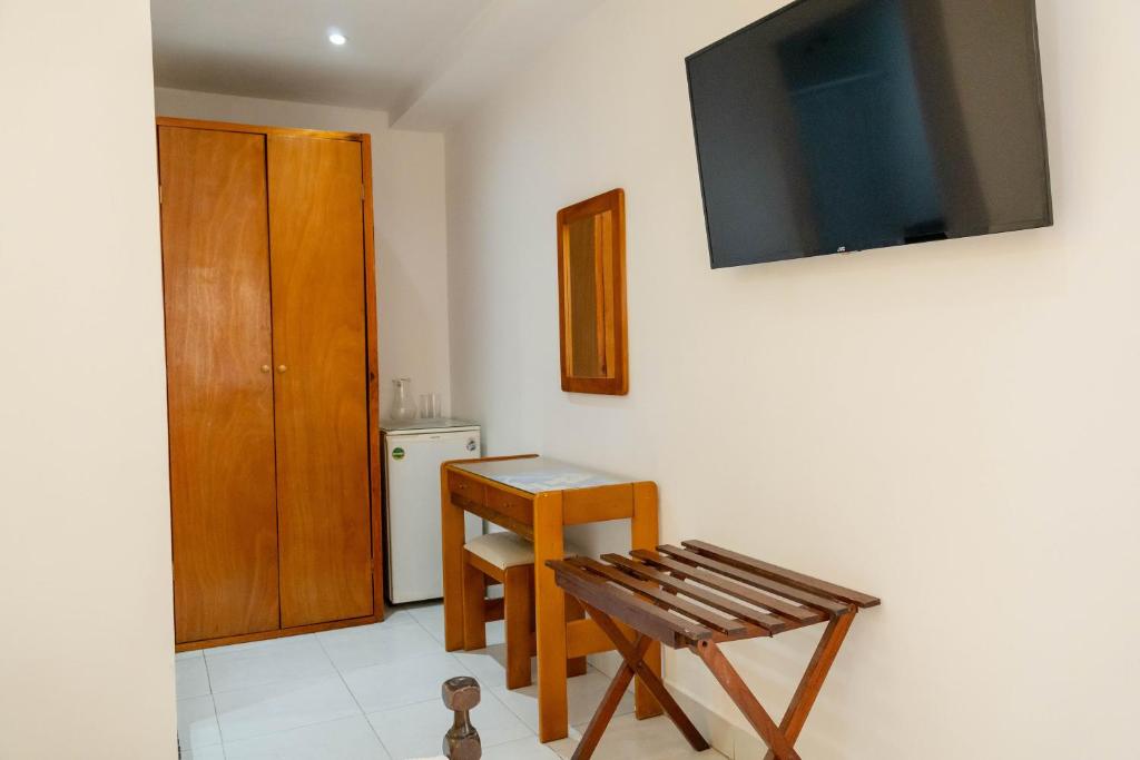 TV a/nebo společenská místnost v ubytování Hotel Veleros Cartagena