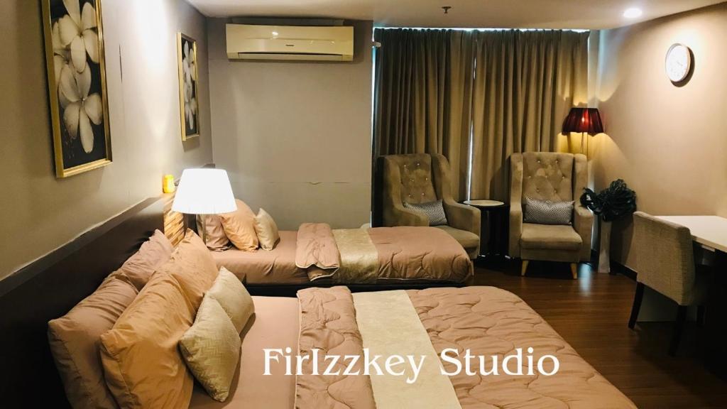 Postel nebo postele na pokoji v ubytování FirIzzkey Studio