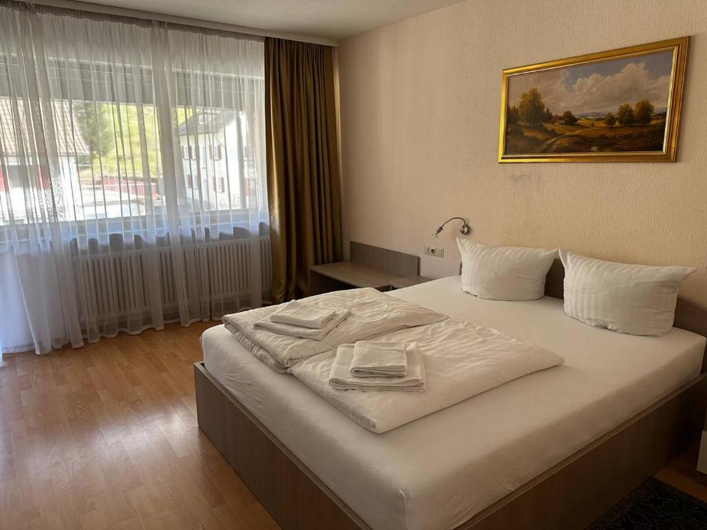 Postel nebo postele na pokoji v ubytování Schwanen-Resort