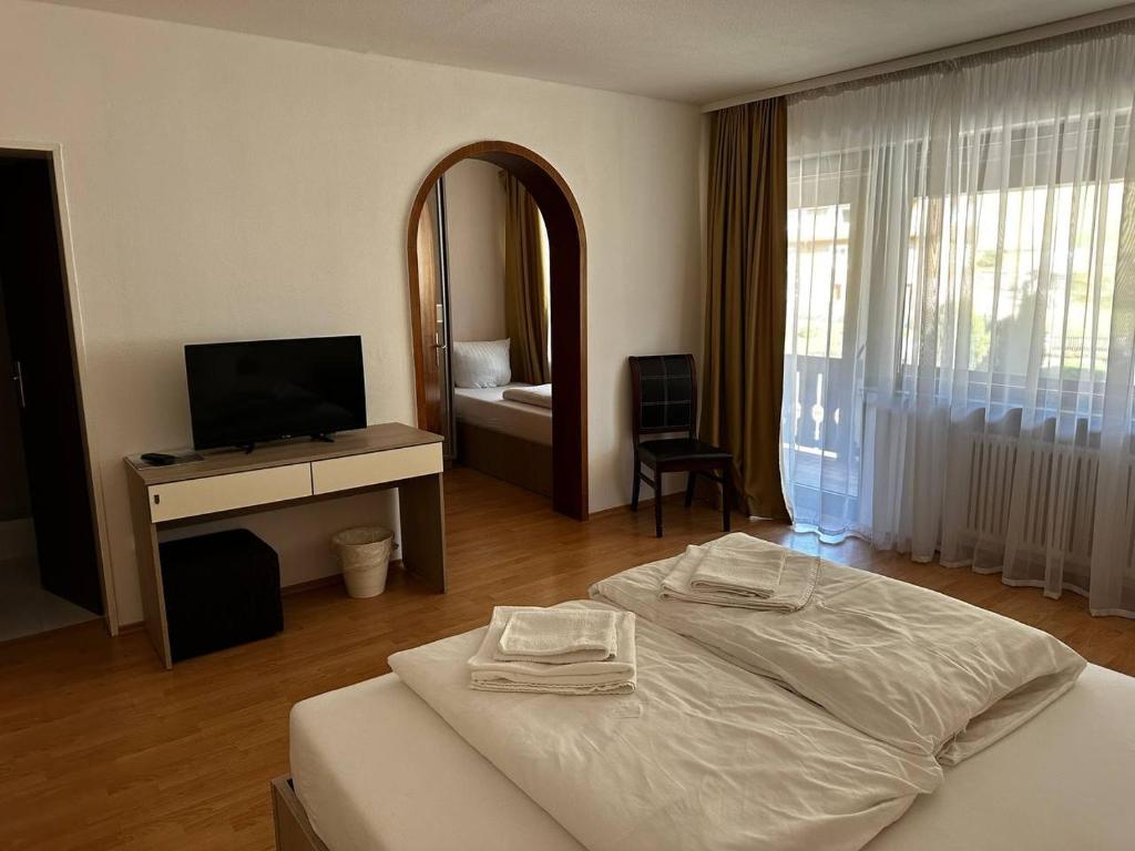 Postel nebo postele na pokoji v ubytování Schwanen-Resort