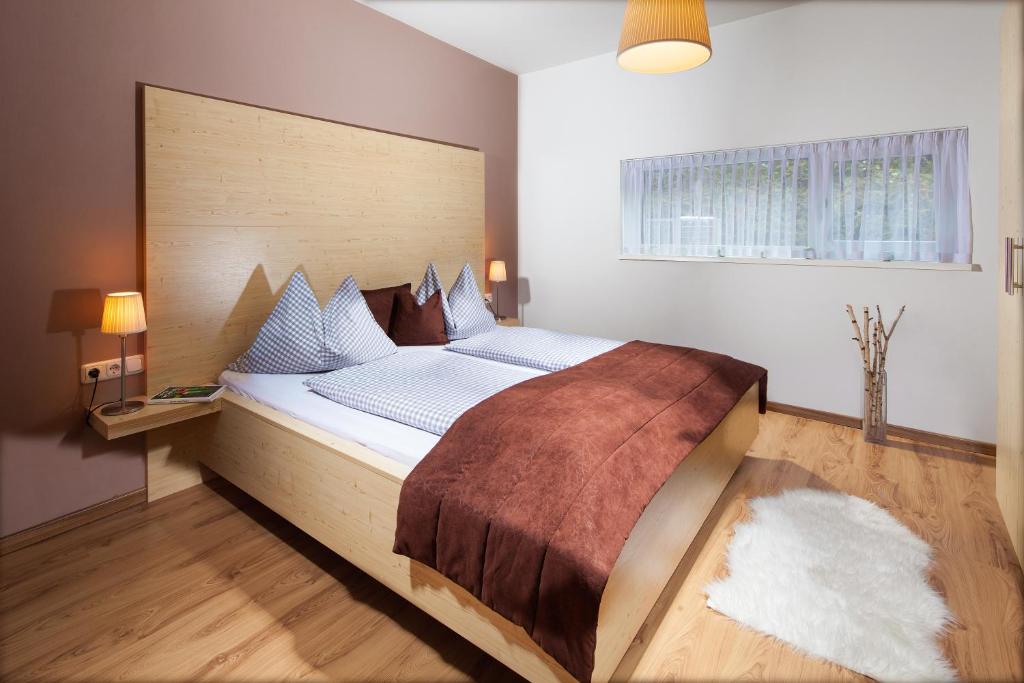 Postel nebo postele na pokoji v ubytování Hotel Apartment Das Au- Gut