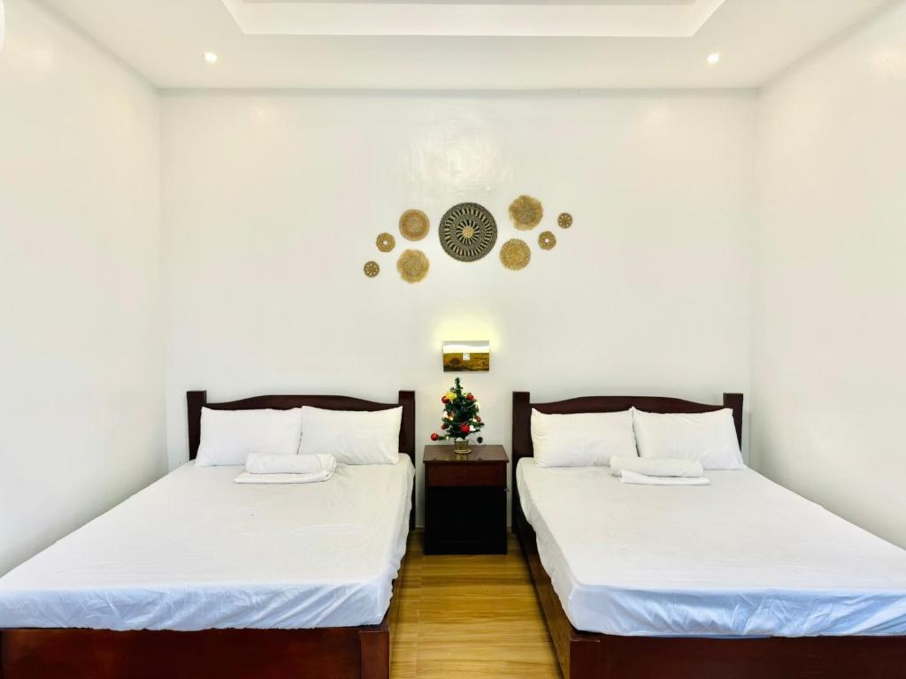 Postel nebo postele na pokoji v ubytování Kubo Royale Private Villa