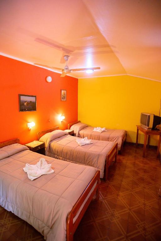 Postel nebo postele na pokoji v ubytování Hosteria Los Helechos
