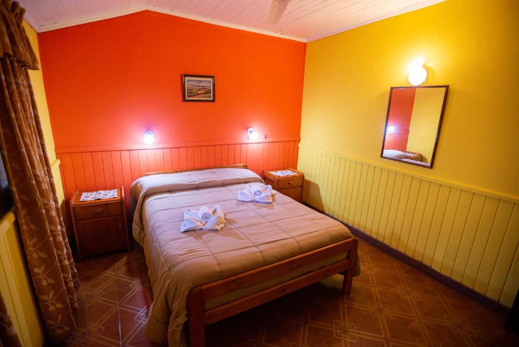 Postel nebo postele na pokoji v ubytování Hosteria Los Helechos
