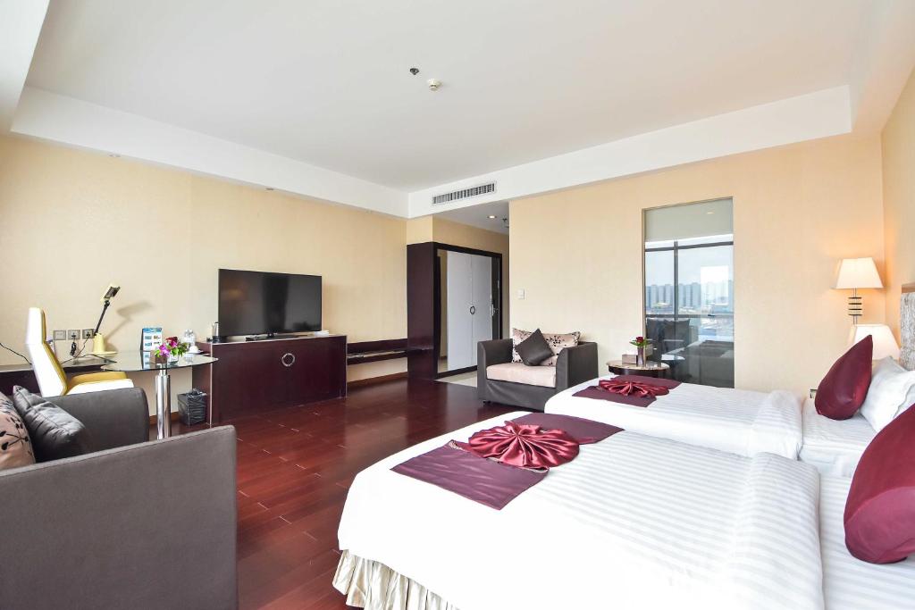 TV a/nebo společenská místnost v ubytování Dara Airport Hotel