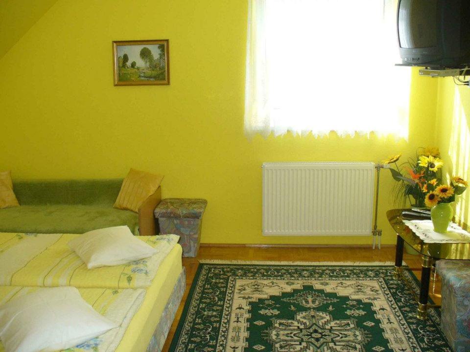 Voodi või voodid majutusasutuse Caty Vendégház toas