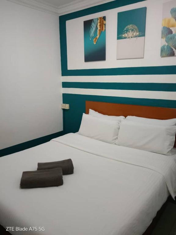Postel nebo postele na pokoji v ubytování Apollo hotel