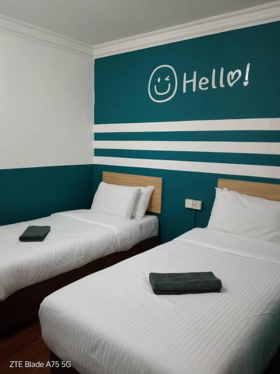 Postel nebo postele na pokoji v ubytování Apollo hotel