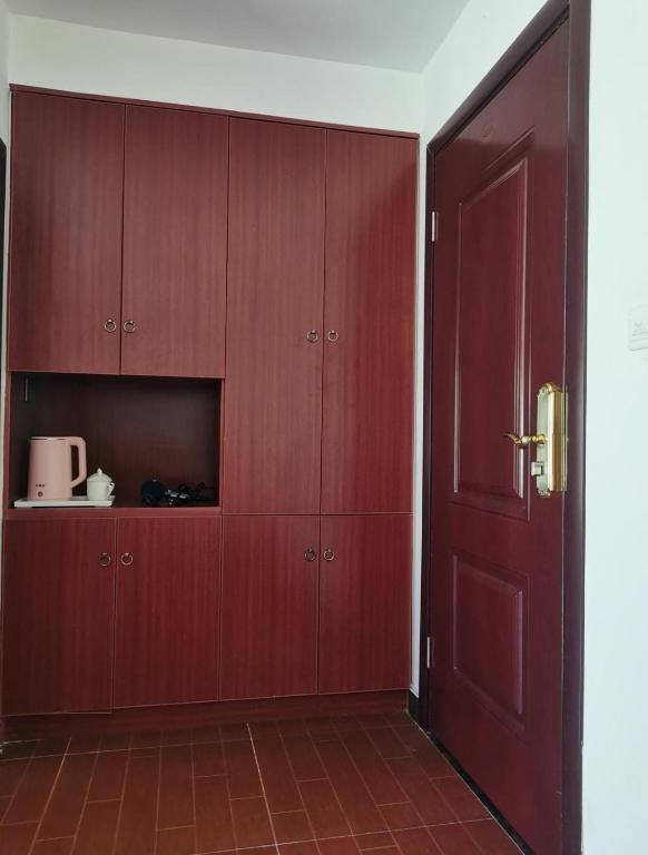 Fotografie z fotogalerie ubytování Junyao Inn v destinaci Tangkou