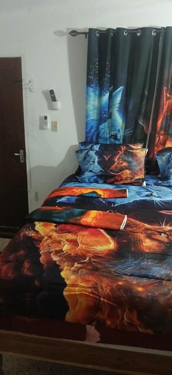 Letto o letti in una camera di Holiday Rooms in Port Morant St Thomas Jamaica