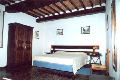 Postel nebo postele na pokoji v ubytování Albergo La Sfinge