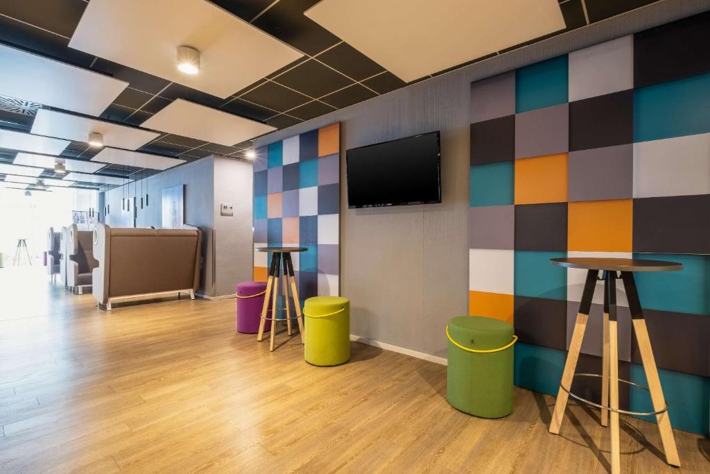 TV a/nebo společenská místnost v ubytování Hotel Berlin Lichtenberg