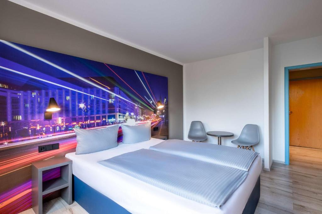 Postel nebo postele na pokoji v ubytování Hotel Berlin Lichtenberg