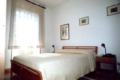 Postel nebo postele na pokoji v ubytování Albergo La Sfinge