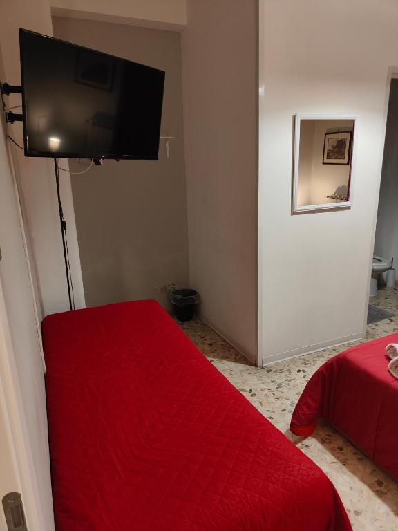 Telewizja i/lub zestaw kina domowego w obiekcie Etnea Gioeni House Suite
