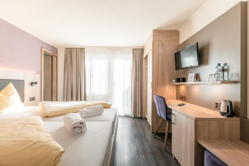 TV a/nebo společenská místnost v ubytování Hotel Kreuz