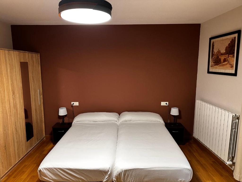 Posteľ alebo postele v izbe v ubytovaní Hostal Rural 18 de Abril