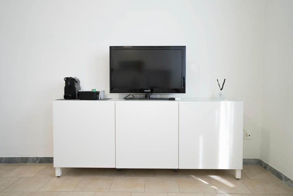 TV a/nebo společenská místnost v ubytování Ale E-Commerce Holiday Home