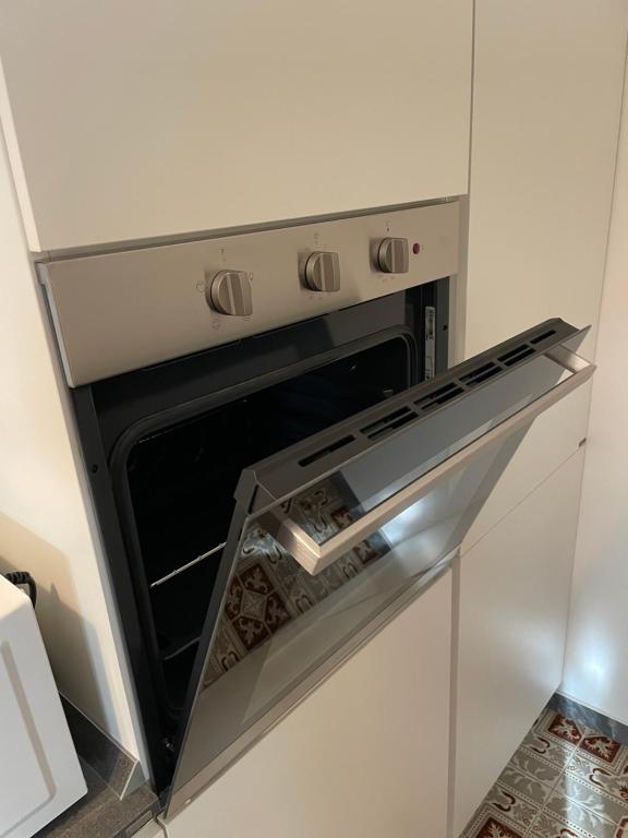 Kuchyň nebo kuchyňský kout v ubytování Ale E-Commerce Holiday Home