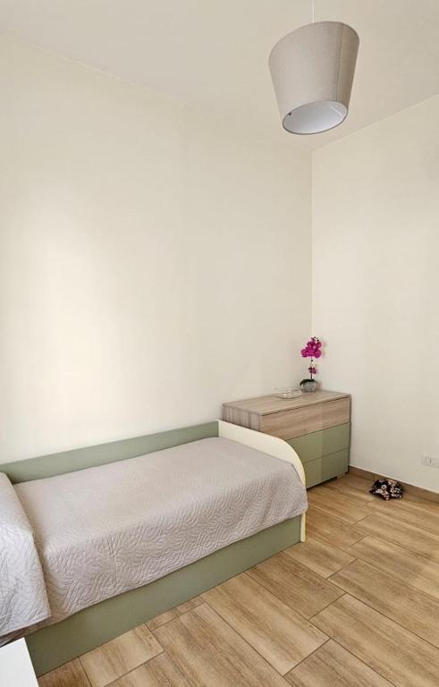 Postel nebo postele na pokoji v ubytování Appartamento Granella
