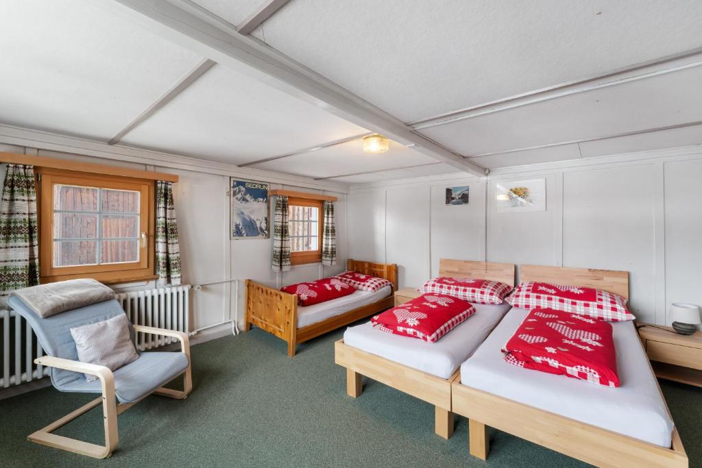 Ліжко або ліжка в номері Apartment Via Alpsu - 24-7 Self Check-in