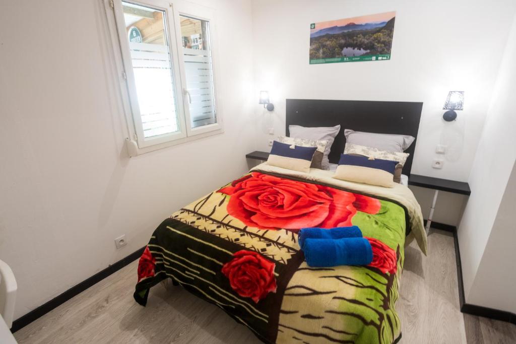Postel nebo postele na pokoji v ubytování LES AGAPANTHES du 27 -ème