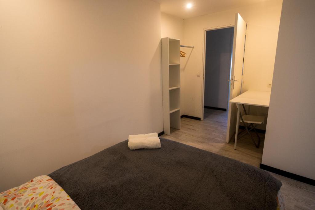 Postel nebo postele na pokoji v ubytování LES AGAPANTHES du 27 -ème