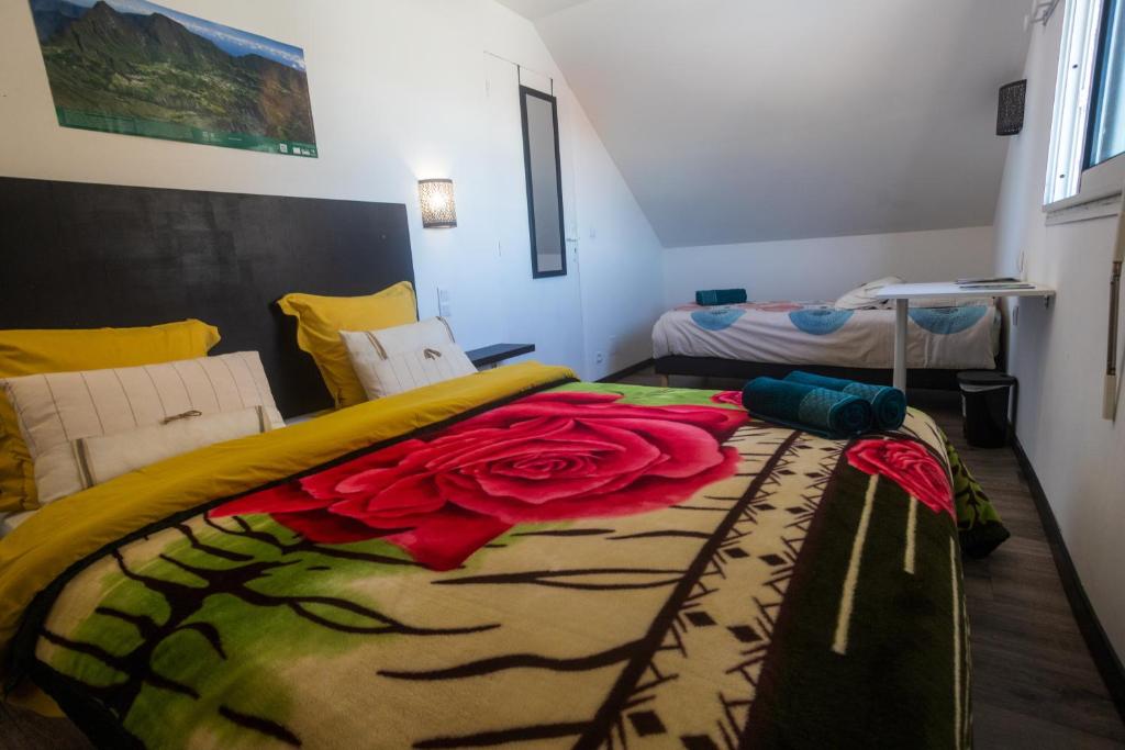 Postel nebo postele na pokoji v ubytování LES AGAPANTHES du 27 -ème