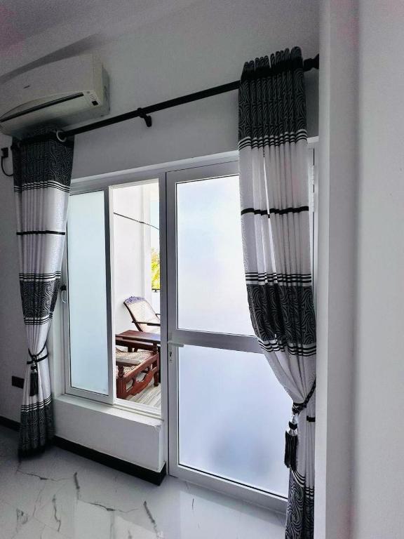 Postel nebo postele na pokoji v ubytování Garden Beach Hotel
