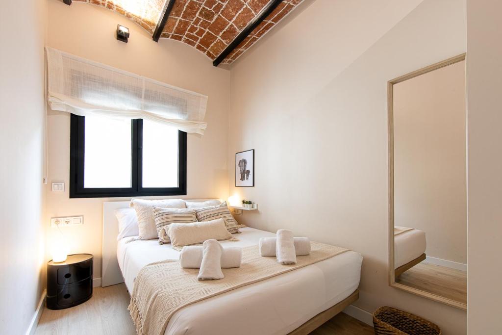 Posteľ alebo postele v izbe v ubytovaní Barcelona Touch Apartments - Campalans