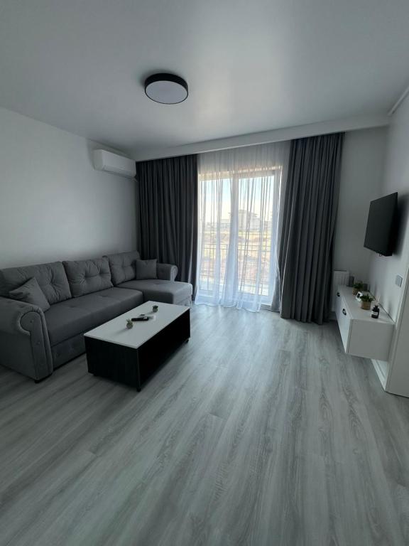 TV a/nebo společenská místnost v ubytování Affordable Cute & Comfy Flat
